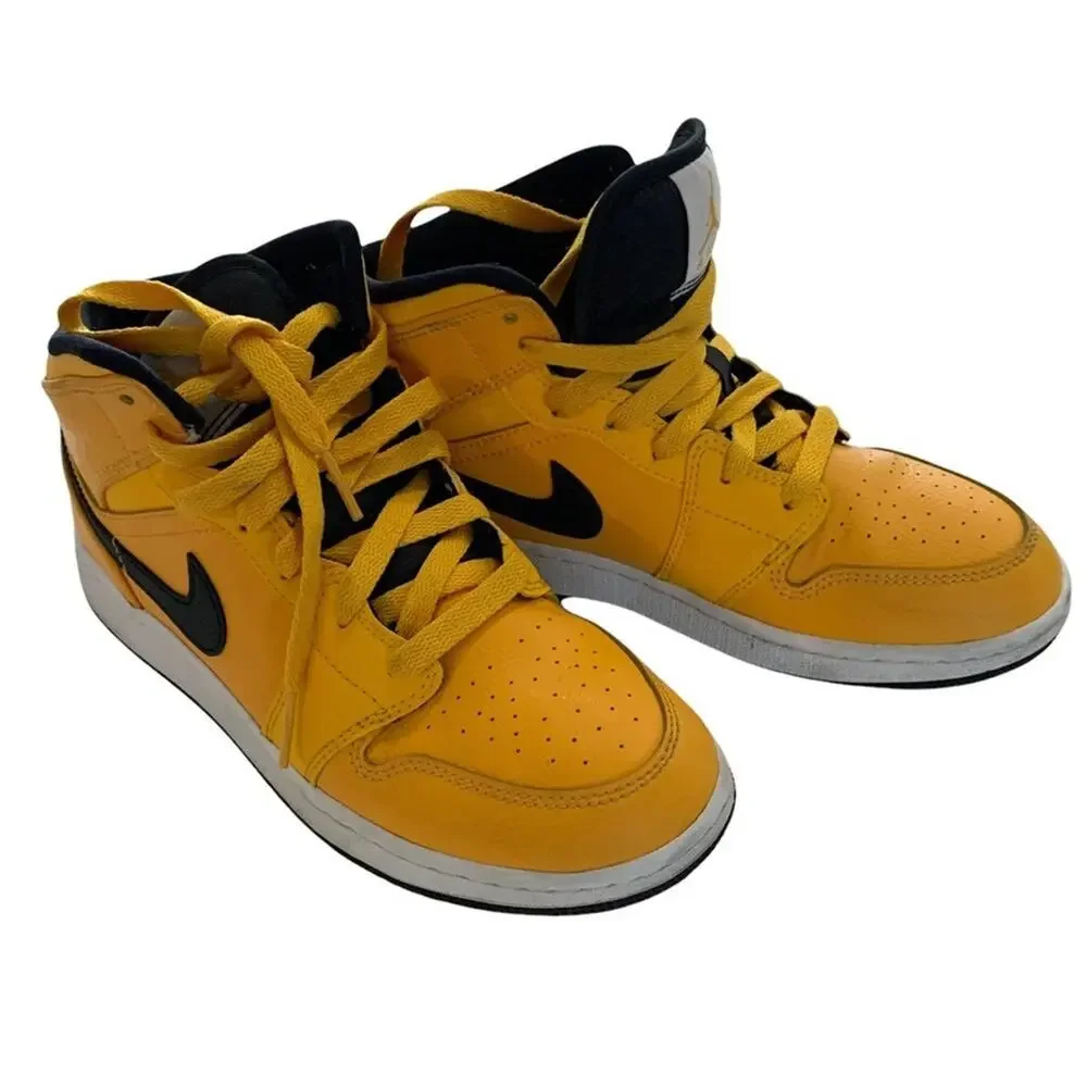 Nike air Jordan 1 mid university gold.‎ Size 4.5Y